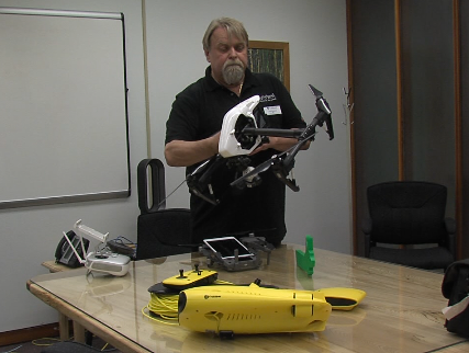 Dr. Ulf Runesson shows drone and controller components used in LU's Natural Resources Management department (Tyler Kelaher/TBTV)