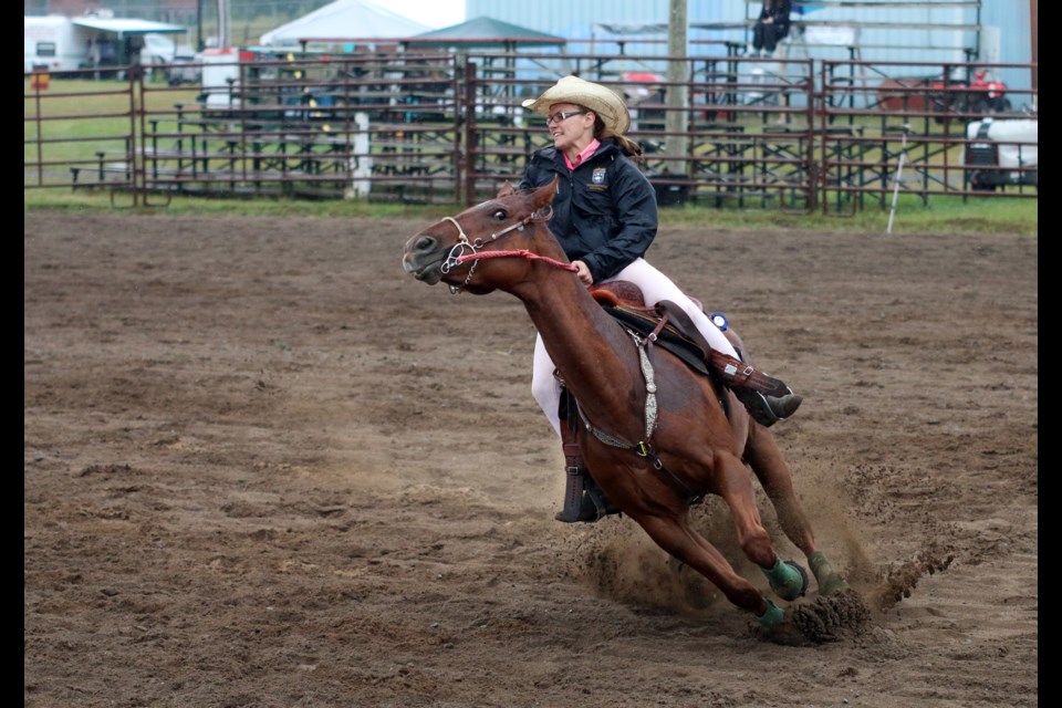 Alexa Desjardins and Jango round an obstacle during a race on Sunday at the Murillo Fair. (Photos by Doug Diaczuk - Tbnewswatch.com). 