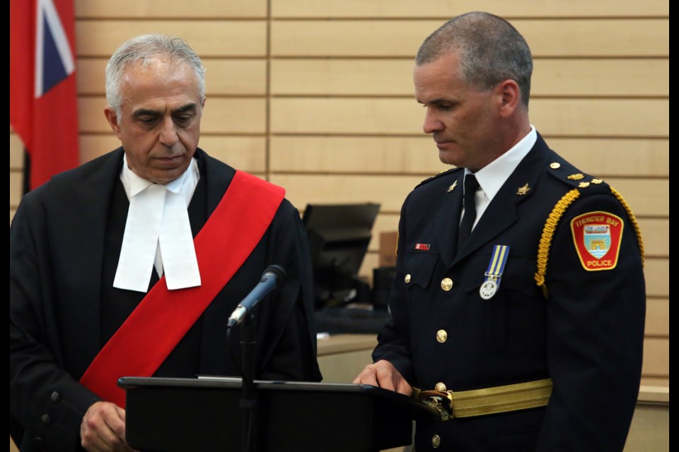 Ryan Hughes was sworn in as deputy chief with the Thunder Bay Police service by Justice Dino Digiuseppe during a ceremony on Thursday at the Thunder Bay Courthouse. (Photos by Doug Diaczuk - Tbnewswatch.com).