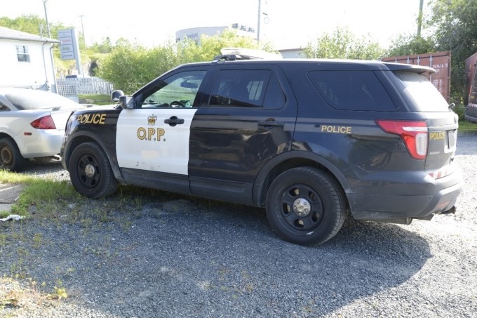 A 17-year-old girl suffered a broken ankle exiting this OPP SUV while it was moving (SIU photo)