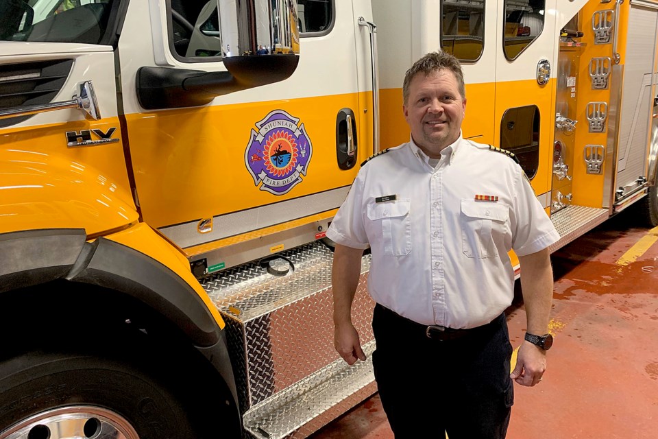 Shuniah Fire and Emergency Service Chief Blair Arthur with the department's latest acquistion to its fleet. (Leith Dunick, tbnewswatch.com)