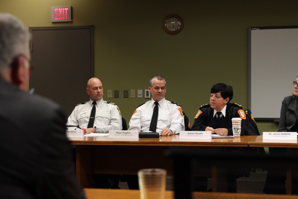 Police Chief Sylvie Hauth answers questions from councillors, as Deputy Chief Ryan Hughes and acting Fire Chief Greg Hankkio look on.