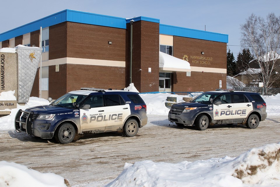 Several police vehicles are on scene on Wednesday, Feb. 13, 2019 outside Hammarskjold High School. (Leith Dunick, tbnewswatch.com)