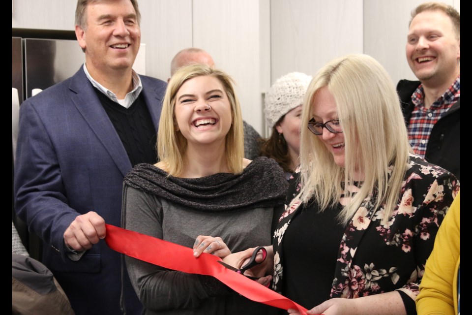 Krista Froome (middle) could not contain her excitement during the ribbon cutting to officially open Hope House at Adult and Teen Challenge. (Photos by Doug Diaczuk - Tbnewswatch.com). 