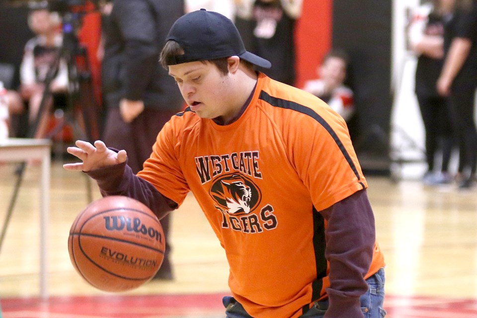Westgate's Piper Hynnes takes part in the Special Olympics basketball qualifying tournament on Thursday, Feb. 21, 2019 at St. Ignatius High School. (Leith Dunick, tbnewswatch.com)