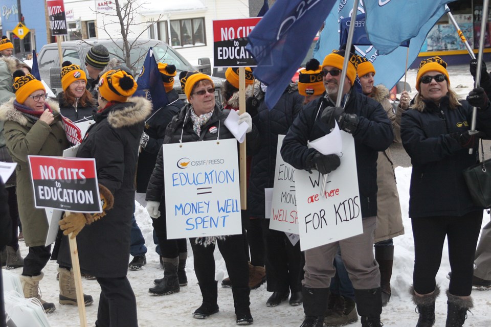 Teachers rally