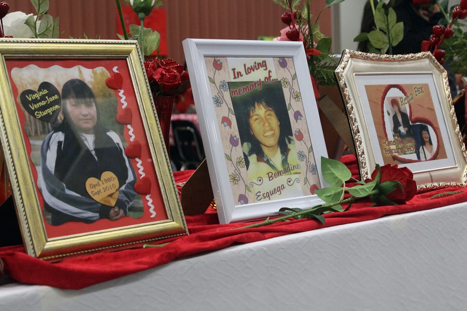 Photos of missing and murdered Indigenous women and girls are shown at the end of the Valentine's Day Memorial Walk. (Matt Vis, tbnewswatch.com)
