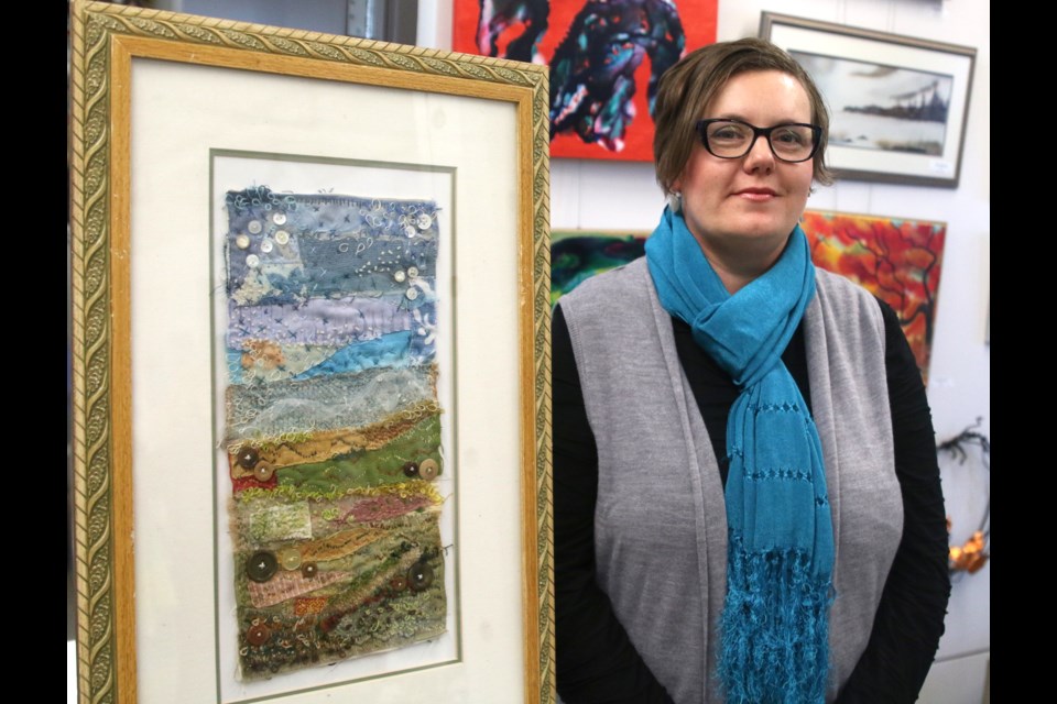 Artist, Elaine Wiersma, with her piece, Whispers in the Wind, is one of 24 artists featured in the fourth Fibre Exhibition on display at the Baggage Building at Prince Arthur's Landing until Mar. 24. (Photos by Doug Diaczuk - Tbnewswatch.com). 