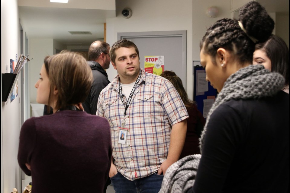 Josh Fraser, a registered nurse at the overdose prevention site, leads a tour with a group of health care professionals at the NorWest Community Health Centre. (Photos by Doug Diaczuk - Tbnewswatch.com). 