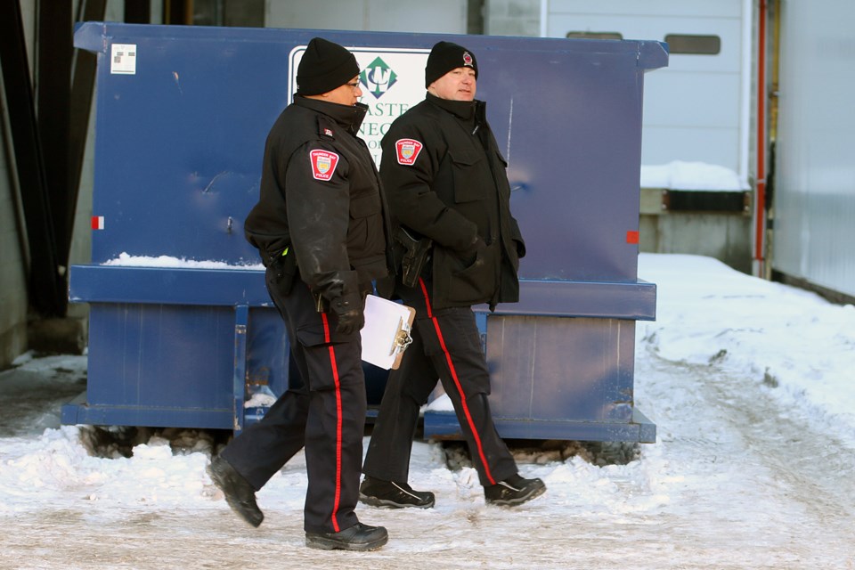 Thunder Bay Police investigate an incident that took place on Friday, Jan. 18, 2019 in a stairwell at the Victoriaville Parkade. (Leith Dunick, tbnewswatch.com)