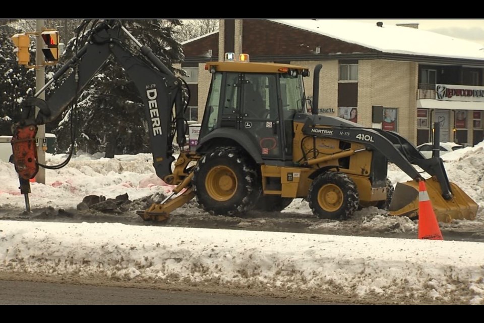 A city crew is working on a broken main at Edward and Redwood (Ben Nesbit/TBTV)