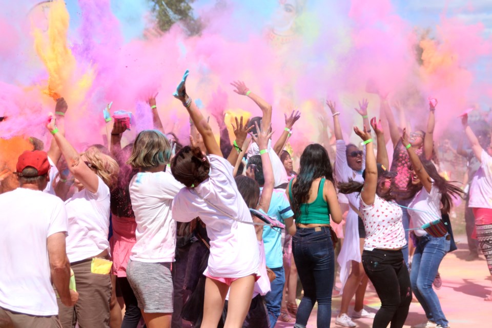 The annual Festival of Colours saw thousands of people throwing handfuls of colour into the air. (Photos by Doug Diaczuk - Tbnewswatch.com). 