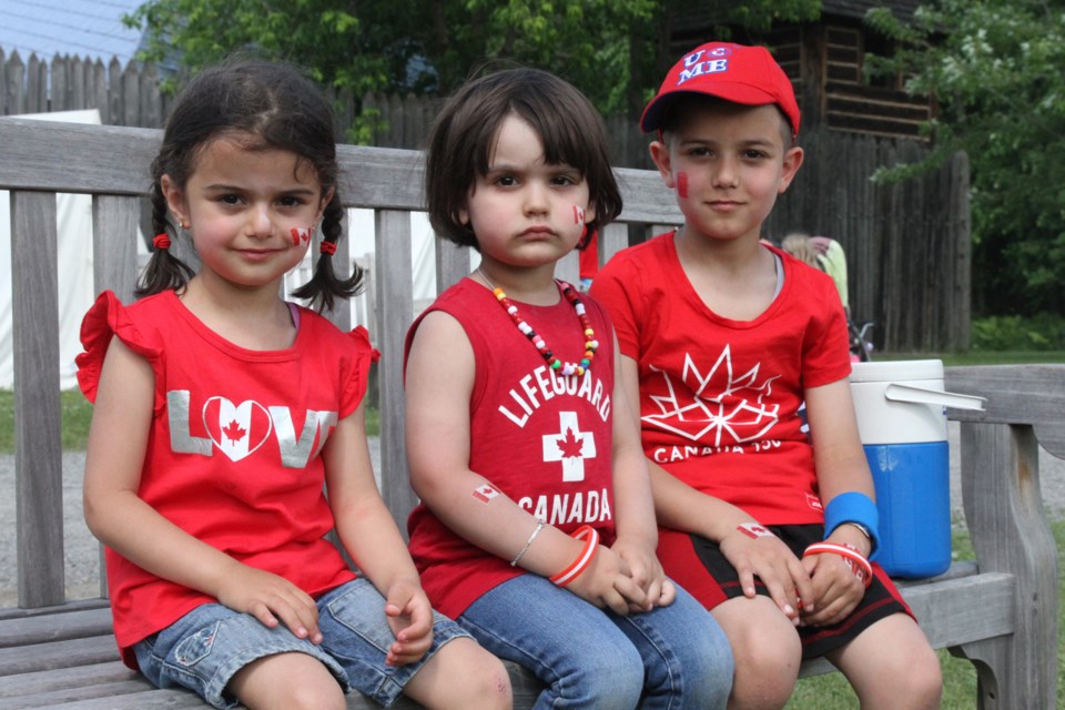 Eva Nasser (left), Amir Barhoum, and Mahdi Nasser at Fort William Historical Park on July 1, 2019.(Michael Charlebois, tbnewswatch)