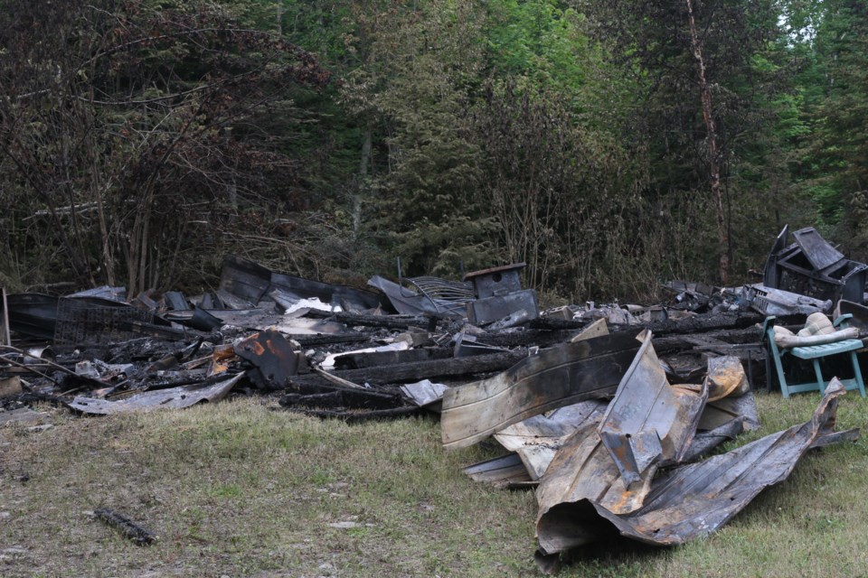 The remains of a Grand Point Road home was destroyed by fire early Thursday morning. (Michael Charlebois, tbnewswatch)