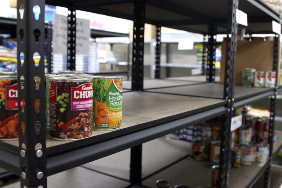 Shelves at the Thunder Bay Shelter House are quickly becoming empty and staff and volunteers are hoping the community will once again come out to help restock the food room. (Photos by Doug Diaczuk - Tbnewswatch.com). 