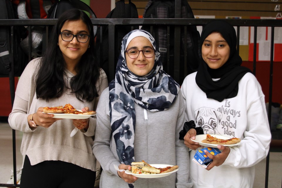 Students Ayesha Asad, Zahraa Alsumadi, and Sarah Sharaf celebrate Eid al-Fitr during a feast hosted by the Lakehead Public School Board. (Photos by Doug Diaczuk - Tbnewswatch.com). 
