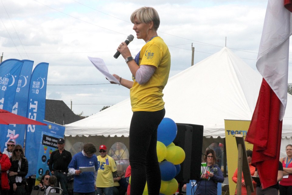 Kim Frances, the survivor speaker, told her story before the event on Saturday.