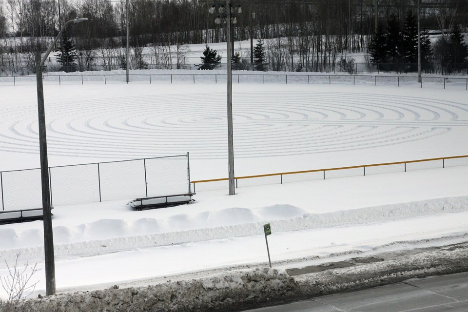 The pattern made by Dave Nicholson in the snow-covered baseball diamond on Cumberland Street, as seen on Wednesday, March 6, 2019. (Matt Vis, tbnewswatch.com)