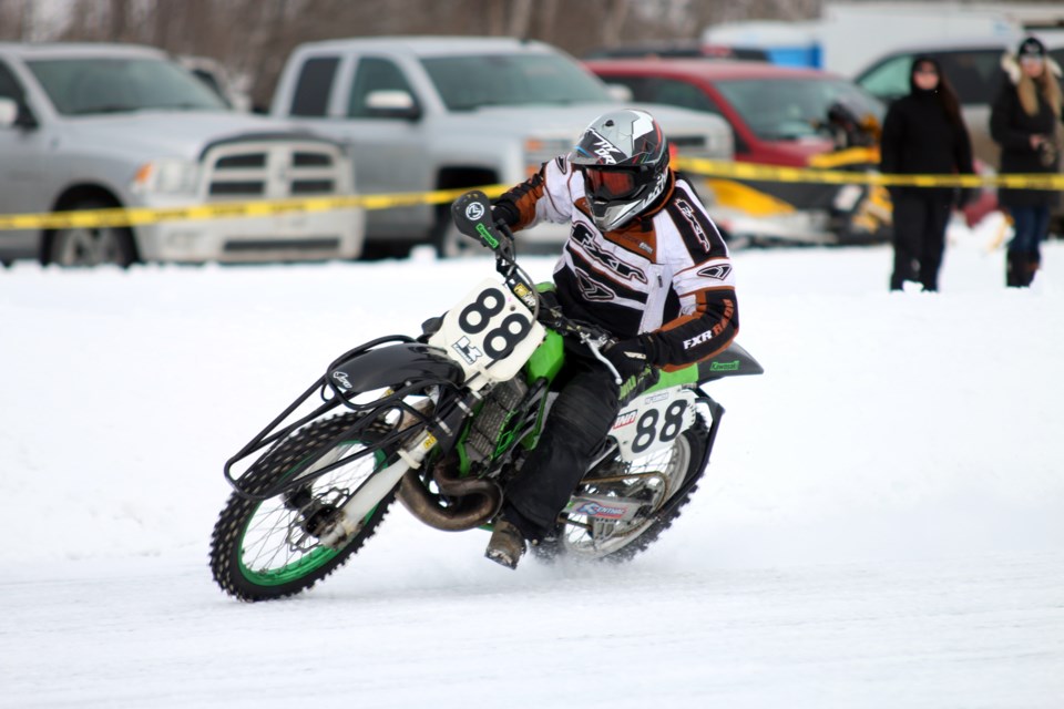 Robbie Powell leans into a bend during the Bobby Powell Memorial Motorcycle Ice Race on Sunday at Wild Goose Bay, named in memory of long-time supporter and videographer, Bobby Powell. (Photos by Doug Diaczuk - Tbnewswatch.com). 