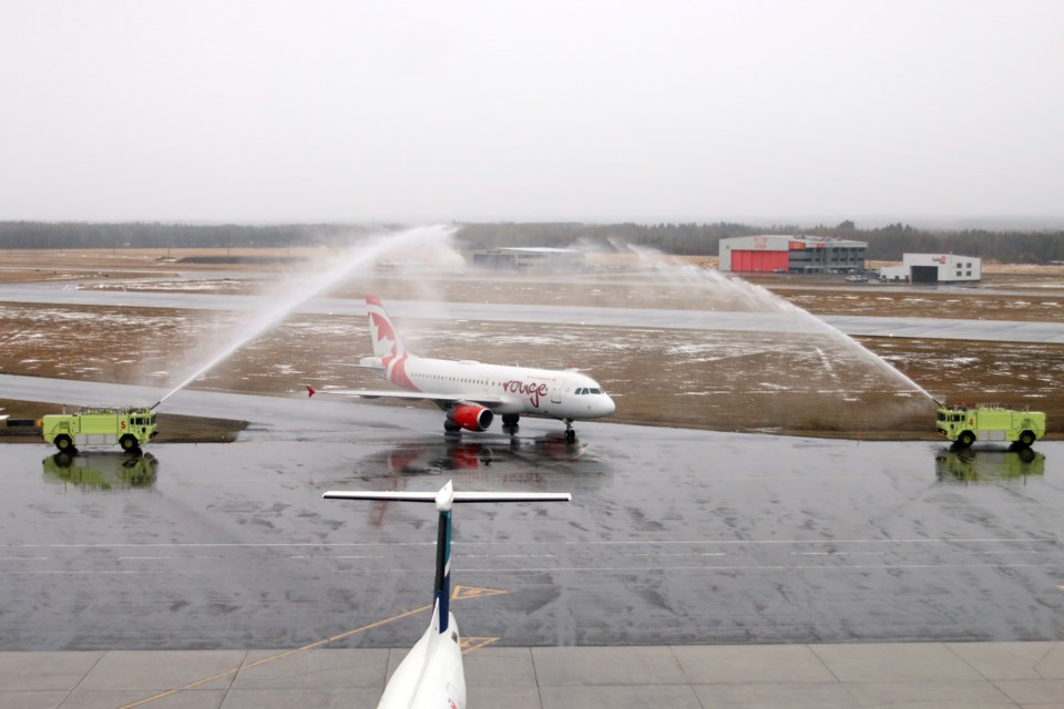 The first Air Canada Rouge jet to touch down in Thunder Bay was greeted by a water cannon salute as it pulled up to the Thunder Bay International Airport. (Photos by Doug Diaczuk - Tbnewswatch.com). 