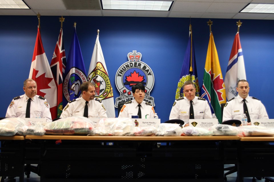 Members of the Joint Task Force announced the seizure of millions of dollars in cash and drugs and 13 firearms as part of Project Disruption. (Photos by Doug Diaczuk - Tbnewswatch.com). 