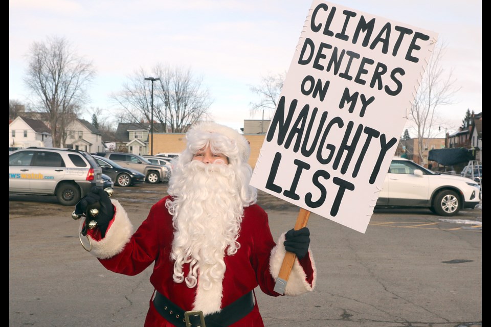 Santa Claus delivered a pre-Christmas message to Thunder Bay on Friday, Nov. 28, 2019 outside the Italian Cultural Centre at a climate change rally organized by local high school students. (Leith Dunick, tbnewswatch.com)