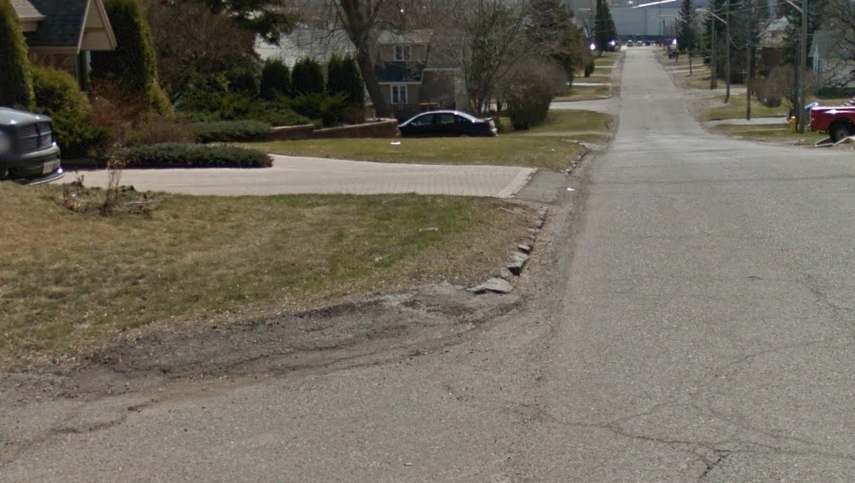 Williams said the flat stones were installed on Hill St. South in lieu of concrete for curbing around 100 years ago (Google Street View)