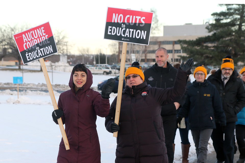 Ontario Secondary Teachers' Federation members hold an information picket outside Westgate Collegiate and Vocational institute on Thursday, Nov. 28, 2019. (Leith Dunick, tbnewswatch.com)