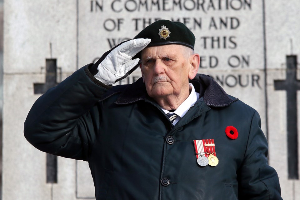 Reitred Master Warrant Officer Ken Cannon salutes the colour party on Monday, Nov. 11, 2019 at the Remembrance Day ceremony at Thunder Bay's Waverley Park. (Leith Dunick, tbnewswatch.com)