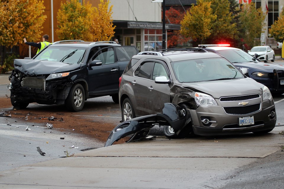 Police investigate a two-vehicle crash on Friday, Oct. 11, 2019 at the intersection of May and Arthur streets. (Leith Dunick, tbnewswatch.com)