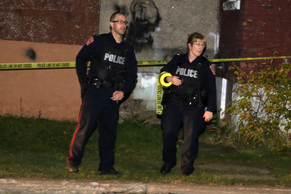 Thunder Bay Police investigate an incident at a residence on the corner of Dease and McKenzie streets on Tuesday, Oct. 8, 2019. (Leith Dunick, tbnewswatch.com)