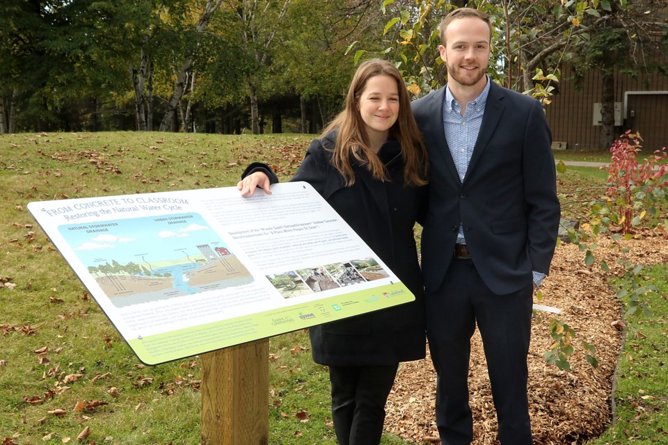 Lakehead University sustainability co-ordinator Ledah McKellar and Eco-Supeior program co-ordinator William Vander Ploeg on Wednesday, Oct. 2, 2019 launch an outdoor classroom at the Thunder Bay school. (Leith Dunick, tbnewswatch.com)
