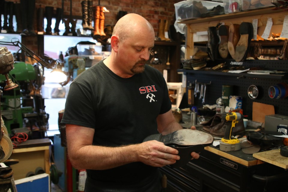 Cobbler Martin Sugg, owner and operator of Timeless Shoe Repair, has won two more international shoe repair competitions this year. (Photos by Doug Diaczuk - Tbnewswatch.com). 