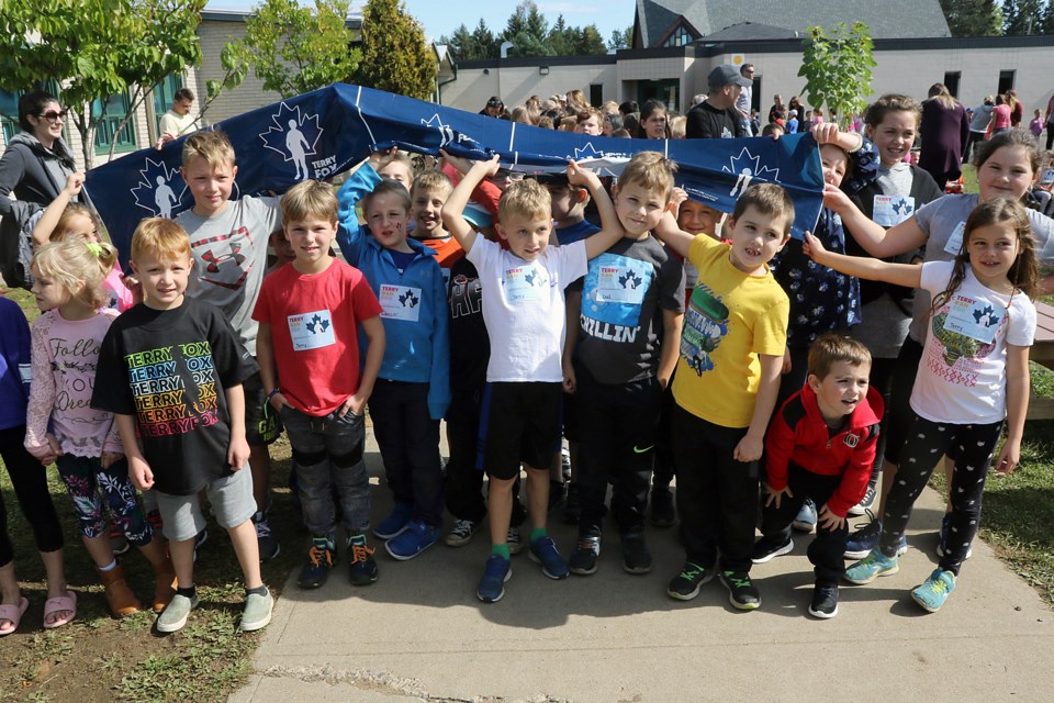 Students at Holy Family School have raised more than $26,000 in support of cancer research over the last nine years and took part in their annual Terry Fox walk on Thursday, Sept. 26, 2019. (Leith Dunick, tbnewswatch.com)