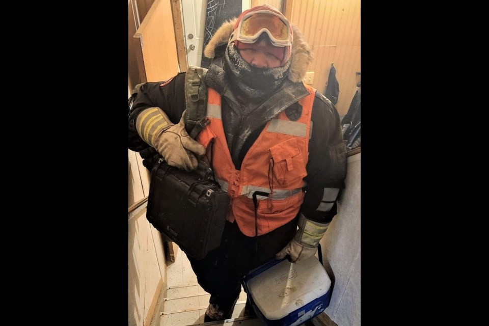 Sgt. Matthew Gull arrived at his home carrying a satellite phone and food hamper on Nov. 23, 2020 after rescuing a fisherman near Peawanuck, Ontario (Tara Sloss photo)