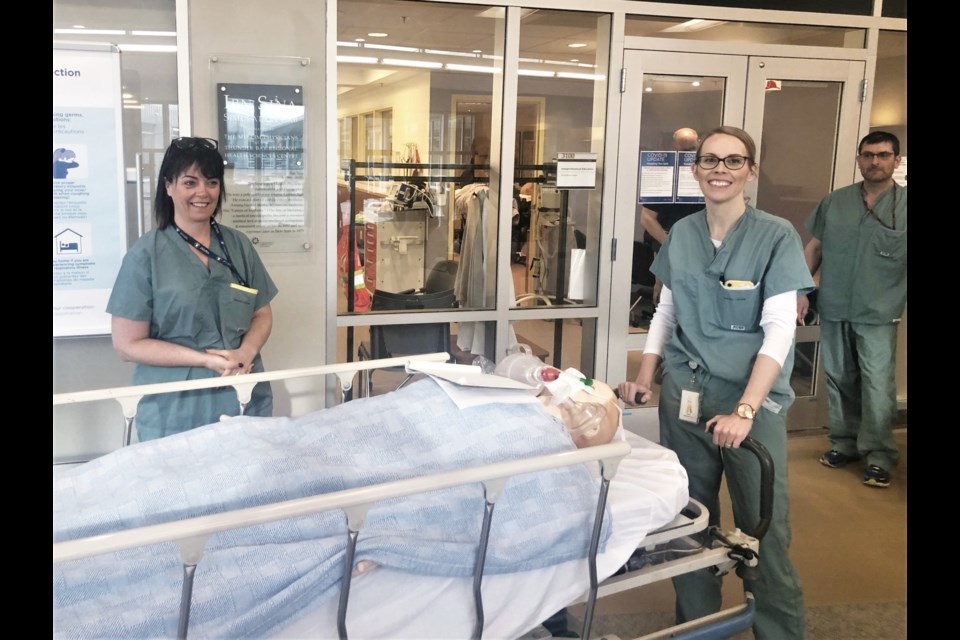 Hospital staff participate in simulations before the opening of a new COVID-19 unit. (Photos courtesy Thunder Bay Regional Health Sciences Centre)