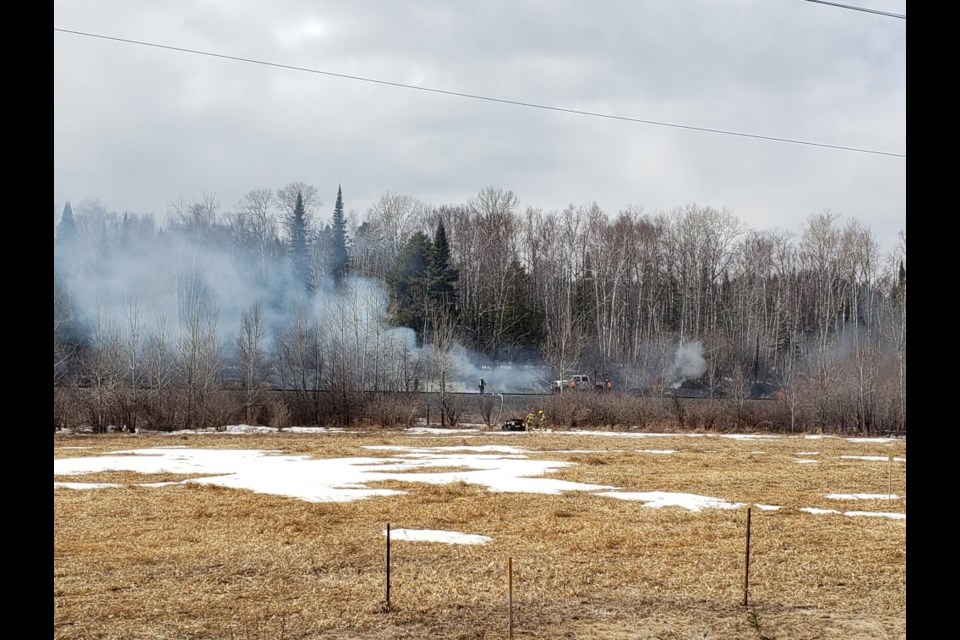 Fire crews battle a wildfire near Pearl, Ont. on Monday, April 20, 2020. (Shuniah Fire and Emergency Services)