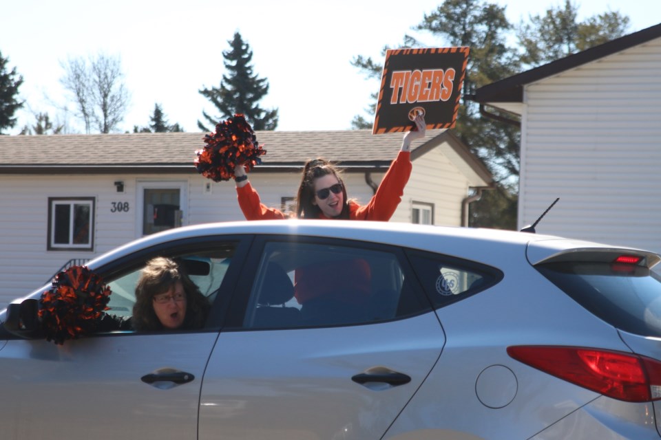 Teachers and staff from Westgate High School held a parade outside of the homes of special needs students, stopping to wave and share words of encouragement during the school closure. (Photos by Doug Diaczuk - Tbnewswatch.com). 