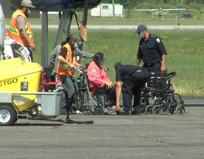 Thunder Bay firefighters assisted evacuees from Eabametoong First Nation who arrived in the city on Aug. 12, 2020 (Cory Nordstrom/TBTV photo)