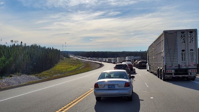 A collision involving two transports and an SUV caused long delays on Highway 17 near Ignace on Saturday. (Photos by Adam Riley, TBT News)