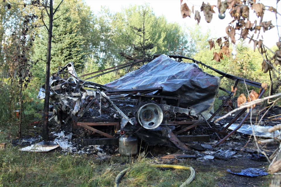 The fire destroyed the mobile home, causing heavy smoke visible in the city's East end. (Ian Kaufman, tbnewswatch.com)