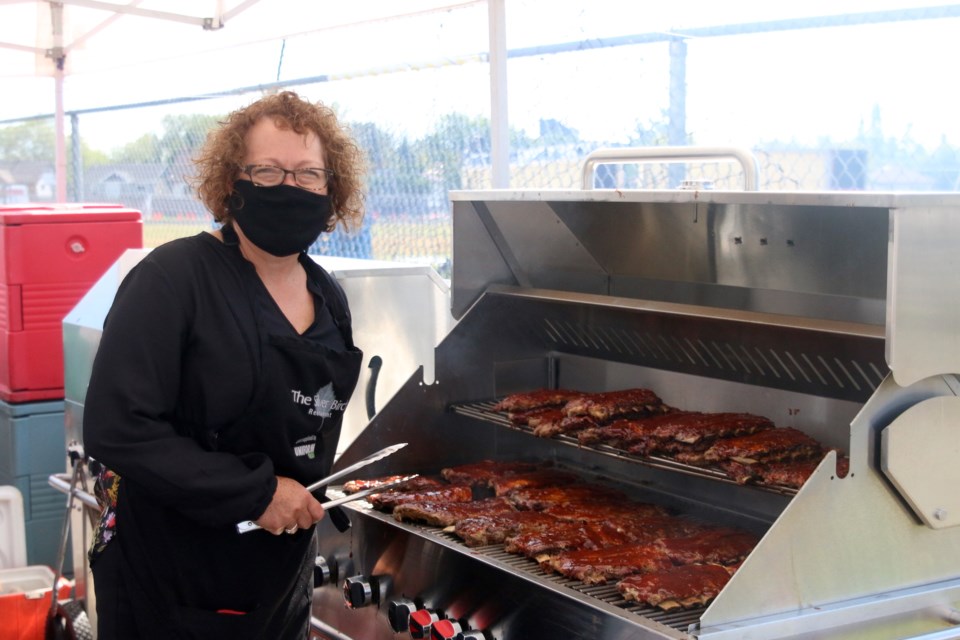 Darlene Green, owner of the Silver Birch Restaurant, offers up some home cooked ribs at this year's Ribfest. (photos by Doug Diaczuk - Tbnewswatch.com). 