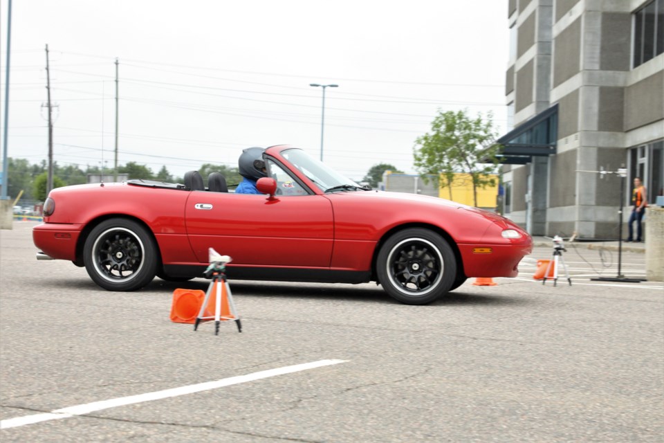 A competitor races through the finish line at a Thunder Bay Autosports Club race Sunday. (Ian Kaufman, tbnewswatch.com)