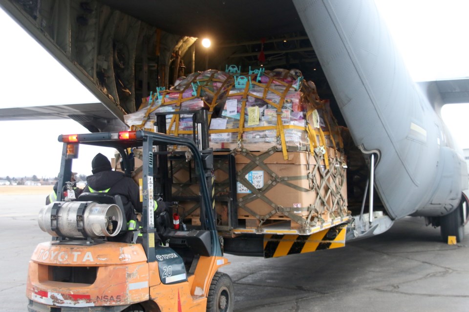 Toys were unloaded from an RCAF Hercules on Friday for the Toys for the North campaign. (Photos by Doug Diaczuk - Tbnewswatch.com). 