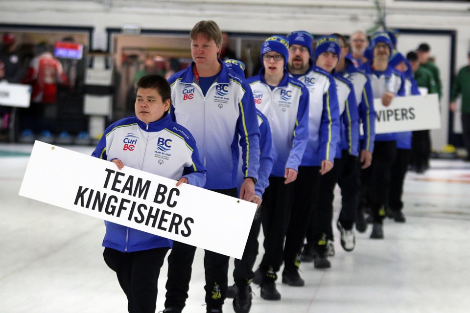 Members of Team British Columbia's Kingfishers take part in the opening ceremony for curling on Tuesday, Feb. 25, 2020. (Leith Dunick, tbnewswatch.com)