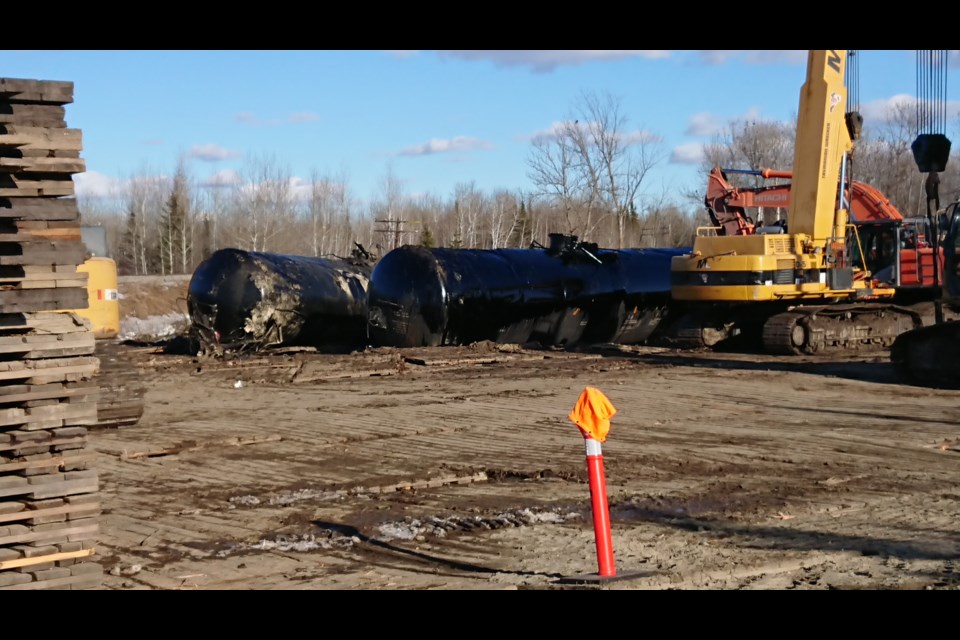 Some damaged tank cars have been moved to a temporary storage site near the derailment site east of Emo (Adam Riley/TBTV)