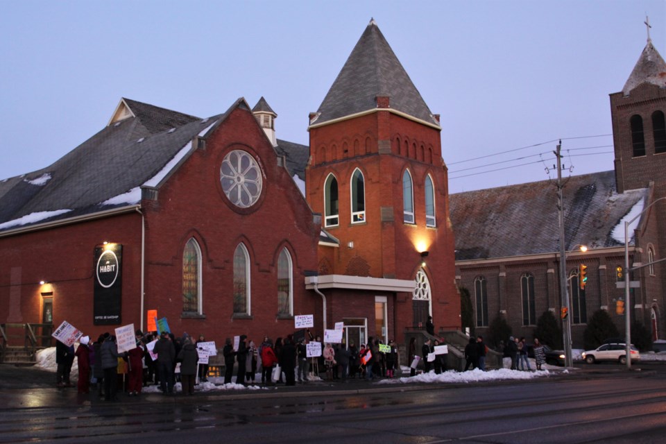Protesters picketed the Abbey's Red River Road location, with many saying they won't engage with the group over its decision to host the screening.