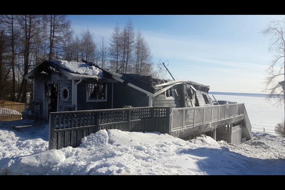 A home on Wild Goose Bay Road was destroyed by a fire Wednesday night. (Photos by Jonathan Wilson, TBT News). 