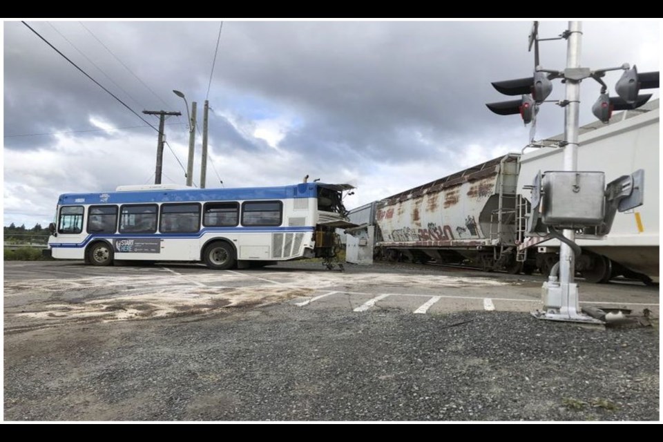 A City of Kenora transit bus was damaged in a collision at a railway crossing on Aug. 8, 2019 (TSB/photo courtesy Kenora Miner & News)