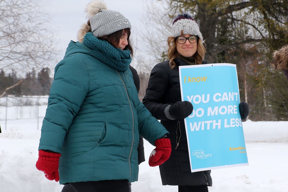 Ontario English Catholic Teachers' Association members at St. Ignatius High School in Thunder Bay picket on Monday, Jan. 13, 2020. (Leith Dunick, tbnewswatch.com)